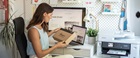 Small business owner opening their ink subscription box 