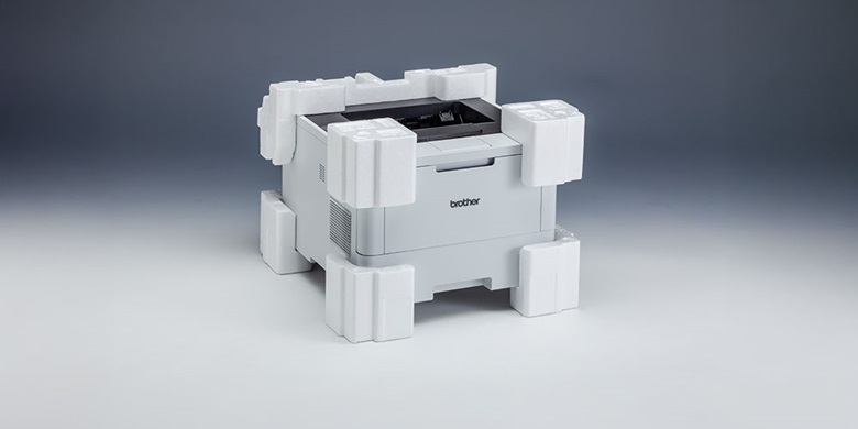 White Brother printer with expanded polystyrene around each of the corners