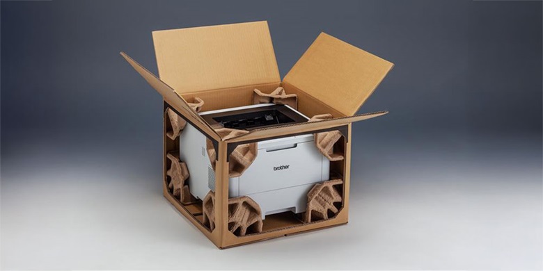 White Brother printer in cardboard box  with the front and side missing to show the moulded pulp corners