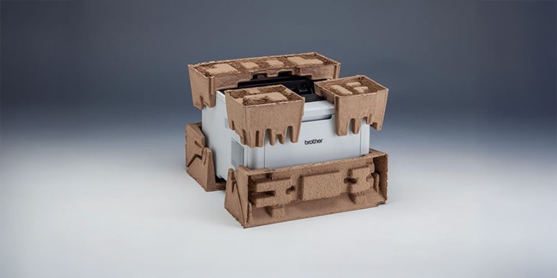 White Brother printer  with cardboard packaging around the edges